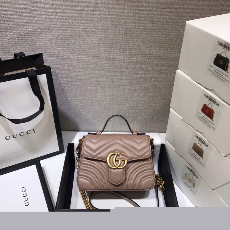 G*u*i top handle bags